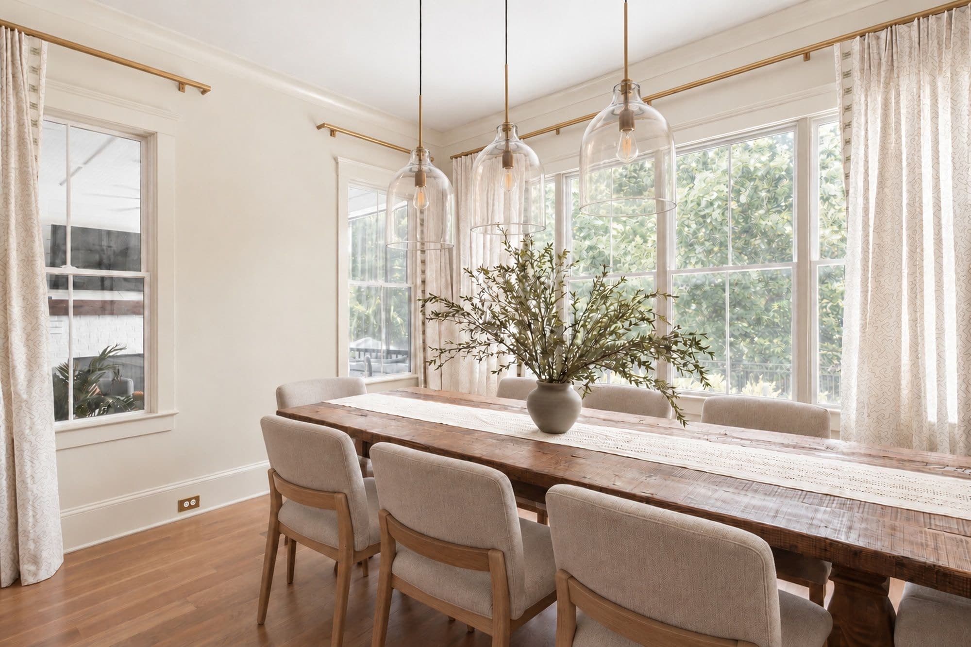Bright dining room with freshly painted cream walls and crisp white trim