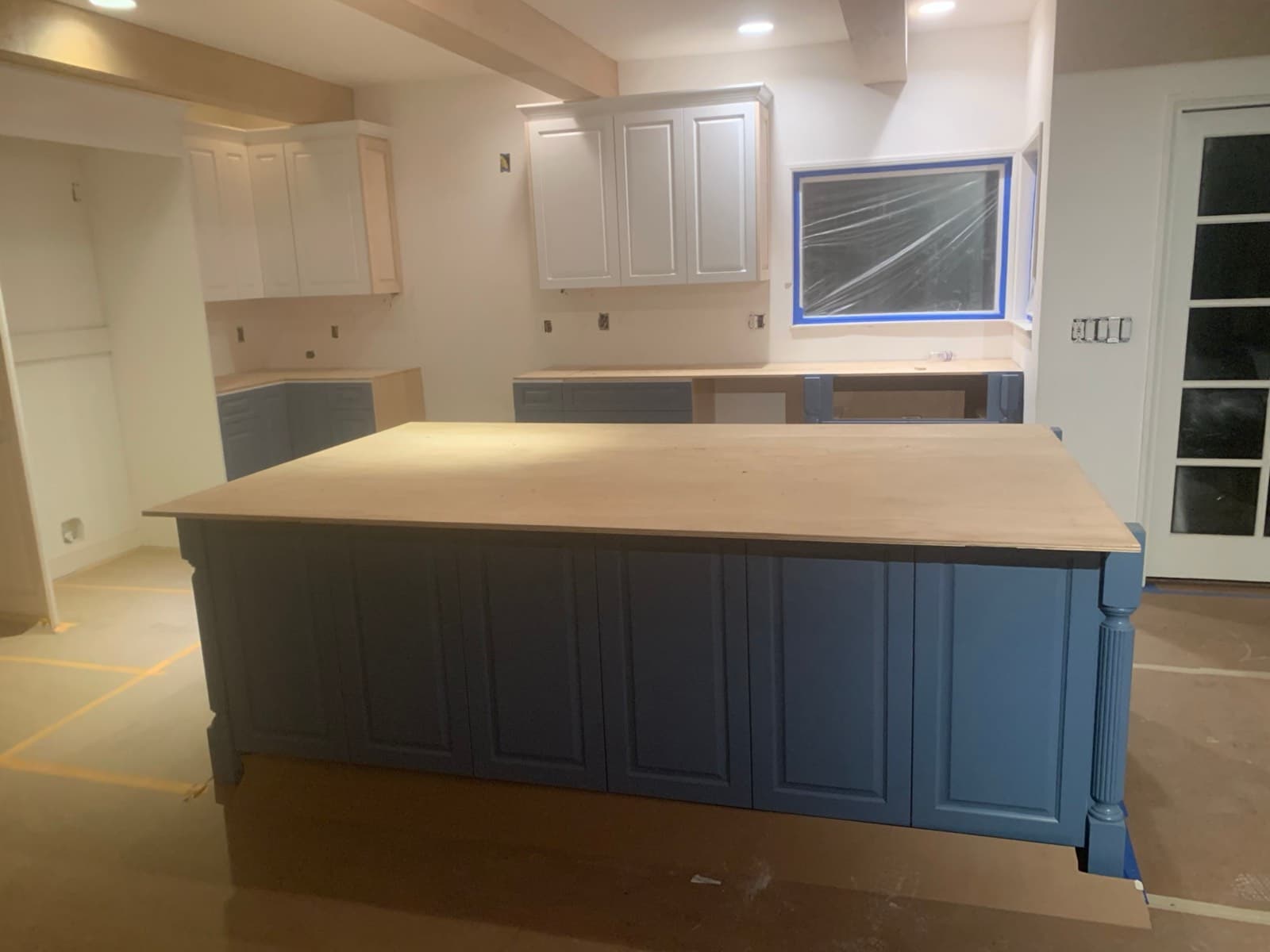 Kitchen island cabinets painted navy blue